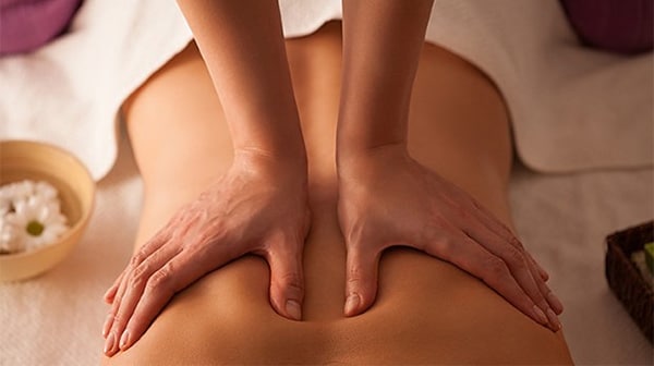 Effective massage steps for back pain relief